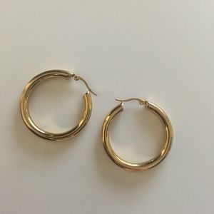 Chunky brass hoop earrings, 1.5” diameter.